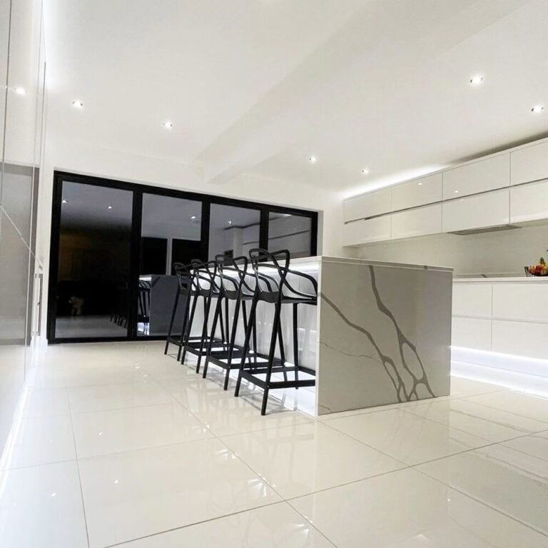 Crystal White Quartz stone Crystallized Stone large format fullbody polished carrara design real installed project photo kitchen island countertop market Australia America super white polished porcelain tile double loading size 600x600mm polished surface installed project effect real photo kicthen floor