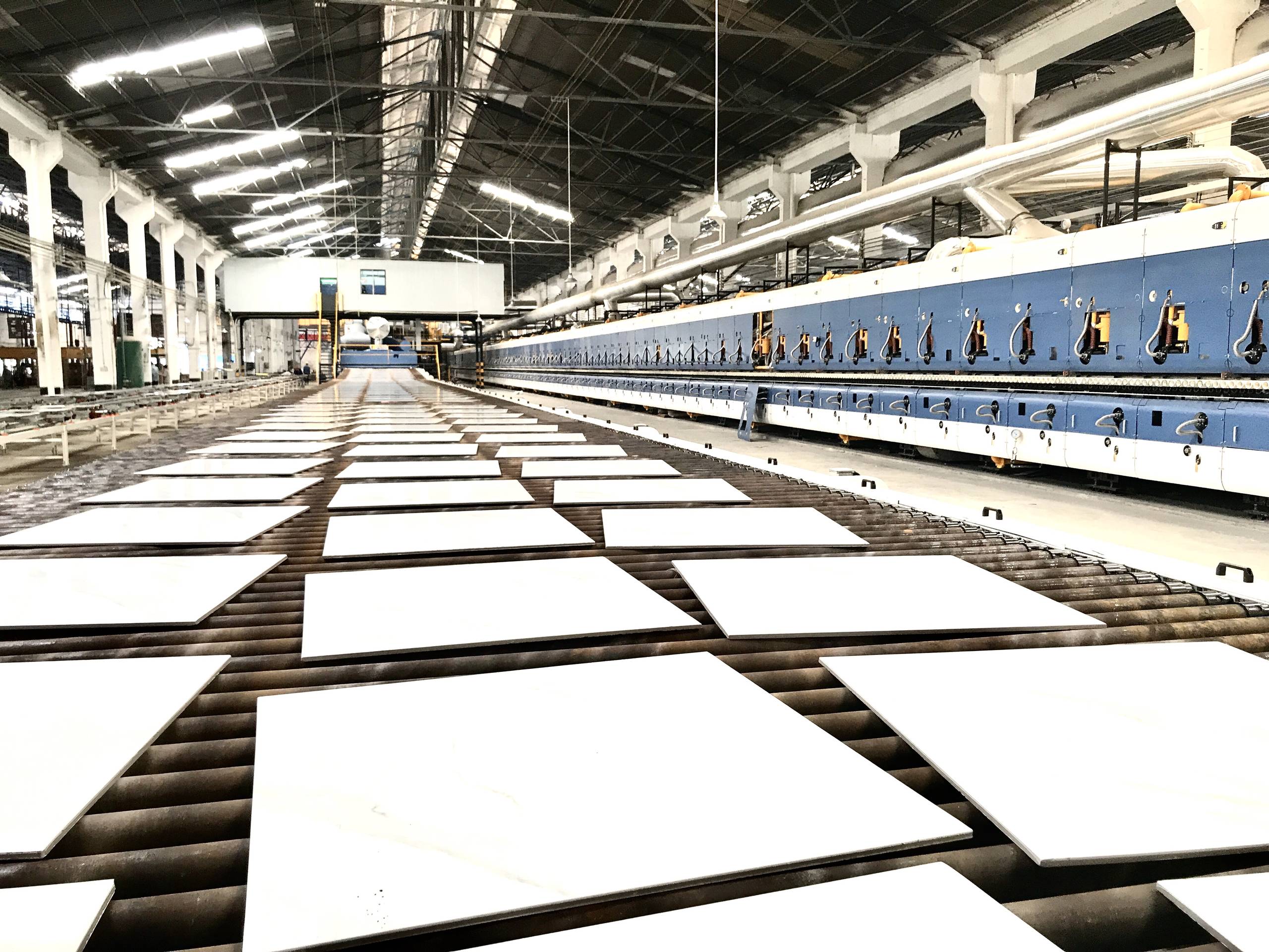 Contigo Ceramics factory production line – large format tiles being inspected by QC team