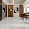 SP66AA07T white black grey charcoal bold terrazzo look glazed polished porcelain tile installed floor effect photo commercial interior project photo glossy white floor