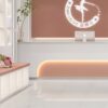 SP66AC01T Nova Speck installed floor effect photo SP66AC01T white cream grey fine speckled terrazzo look glazed polished porcelain tile installed floor effect photo commercial interior project photo glossy white floor