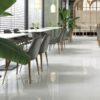 SP66AC05T white red green grey fine speckled terrazzo look glazed polished porcelain tile installed floor effect photo commercial interior project photo glossy white floor